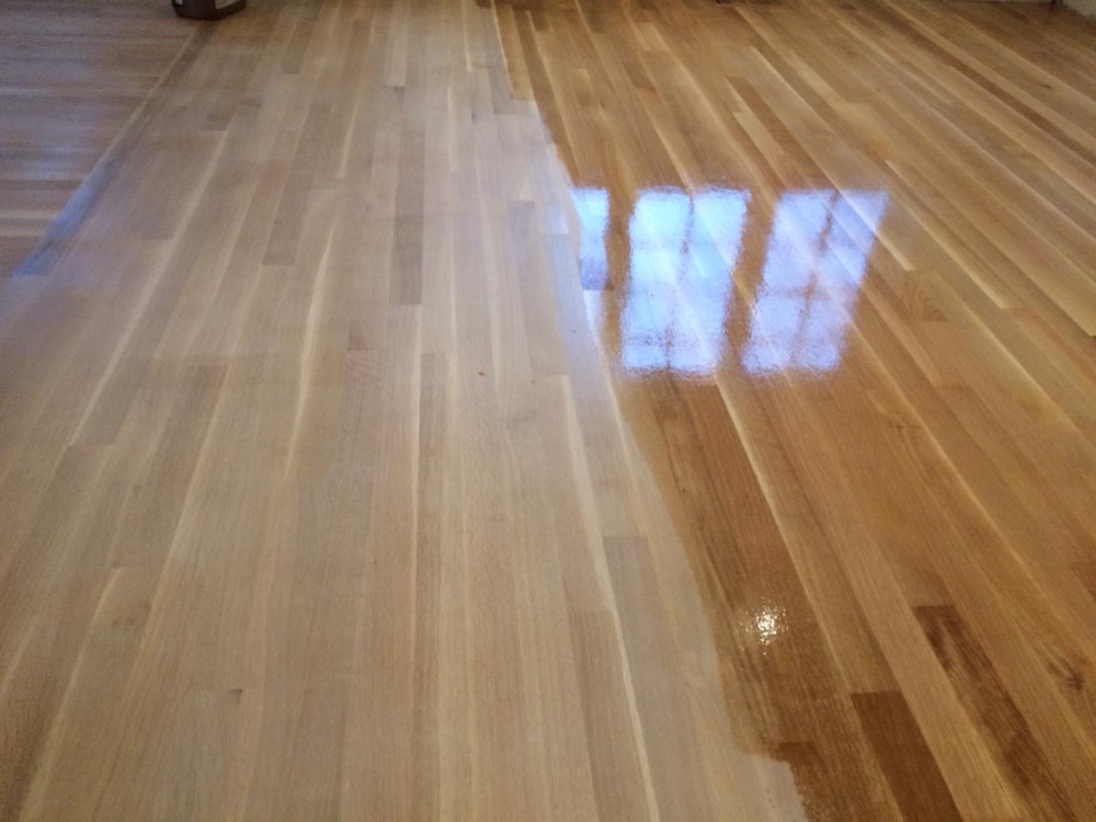 A restored solid hardwood floor in an older West Island home